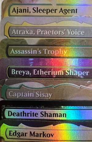 Ajani, Sleeper Agent Assassin's Trophy Atraxa, Praetor's Voice Breya, Etherium Shaper Captain Sisay Deathrite Shaman Edgar Markov